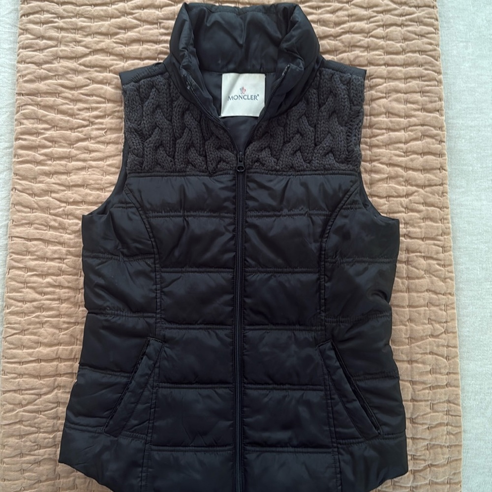 Moncler women's puffer vest with a knitted yoke.
